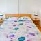 Apartments with parking space Senj - 11520