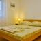 Apartments with parking space Senj - 11520
