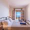 Villa Andonis Nissaki large villa with large pool ,spectacular view very near to the Beach