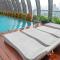 Modern and Spacious 2BR LAvenue Apartment By Travelio