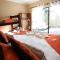 MALI Boutique Lodge & Tube n Axe Budget Accommodation