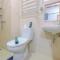 Minimalist and Posh 1BR The Oasis Cikarang Apartment By Travelio