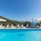 Villa Andonis Nissaki large villa with large pool ,spectacular view very near to the Beach