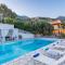 Villa Andonis Nissaki large villa with large pool ,spectacular view very near to the Beach