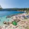 Apartment Noemi with a direct beach view