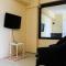 1BR City View at Green Pramuka Apartment near Mall By Travelio