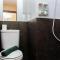 1BR City View at Green Pramuka Apartment near Mall By Travelio