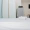 Comfy and Warm Studio Grand Kamala Lagoon Apartment By Travelio