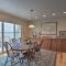 Lakefront De Tour Village Home with Deck and Fire Pit!
