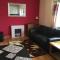 Ground floor 2 bed apartment in central location with private access to 7 miles of sandy beach (sleeps 4)