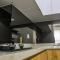 Relaxing 2BR Apartment at M-Town Residence By Travelio