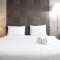 Prime and Comfy Studio at Tamansari La Grande Apartment By Travelio