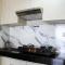 Minimalist 1BR Apartment at M-Town Signature By Travelio