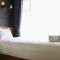 Warm and Cozy 3BR Apartment at M-Town Residence By Travelio