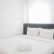 Comfy and Modern 2BR Apartment at Aeropolis Residence By Travelio