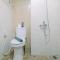 Modern and Comfy Studio Apartment Grand Dhika City By Travelio