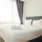 Posh 2BR with Private Lift at Masterpiece The Epicentrum Kuningan Apartment By Travelio
