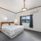 Courtside Quarters - Waihi Beach Holiday Home