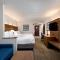 Holiday Inn Express & Suites Charlotte Arpt-Belmont by IHG