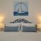 The Bluehouse - Spacious top floor flat with parking, by Mon Repos beach - Città di Corfù