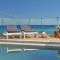 Oceanis Suites with Private Heated Pools and Sea View