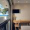 Oceanis Suites with Private Heated Pools and Sea View, by ZanteWize - Kypseli