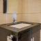 Modern Design 1BR Apartment at Brooklyn Alam Sutera By Travelio