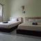 Amed Stop Inn Homestay, Rooftop Restaurant and Bar