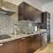 Walk to Beach Modern Cabo Condo with Balcony!