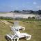 Rez de jardin avec piscine, vue directe sur la plage à 40 m - Trévou-Tréguignec