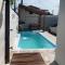 Casa com piscina em c vermelha - Porto Seguro