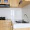 Golf View 1BR Apartment at M-Town Residence By Travelio