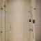 Cozy Living 1BR at Brooklyn Alam Sutera Apartment By Travelio