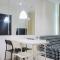 Cozy Living 1BR at Brooklyn Alam Sutera Apartment By Travelio