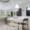 Cozy Living 1BR at Brooklyn Alam Sutera Apartment By Travelio