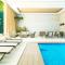 Palmarena Rooms & Residences - Long Stay Comfort with Parking, Sauna, Gym & Pool - Steps from 5th Avenue