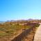 Apartment with pool, sea views & balcony less than 10min walk to La Mata Beach!