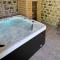 Chambre Comballe charmante avec jacuzzi