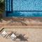 Tsourlakis Residence, A Tranquil Family Oasis with Pool, By ThinkVilla