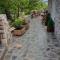 The House in the Cobbled Road