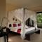 VILLA CAHAYA Perfectly formed by the natural surrounding and Balinese hospitality
