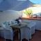One bedroom house at Rosa Marina 20 m away from the beach with enclosed garden and wifi - 罗萨玛里纳
