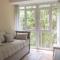 Family-friendly 2 rooms apartment with view to a forest