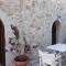 Casa di Sofiana by wood and stone