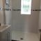 Ground floor 2 bed apartment in central location with private access to 7 miles of sandy beach (sleeps 4)