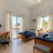 VILLA ALICIA with priv pool, beautiful garden and shady veranda- 5 min to the beach