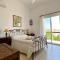 VILLA ALICIA with priv pool, beautiful garden and shady veranda- 5 min to the beach