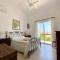 VILLA ALICIA with priv pool, beautiful garden and shady veranda- 5 min to the beach