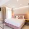 V Luxury Suites