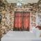 Relieved 1BR Apartment at Serpong Greenview By Travelio